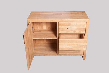 Oak chest of drawers on a light background