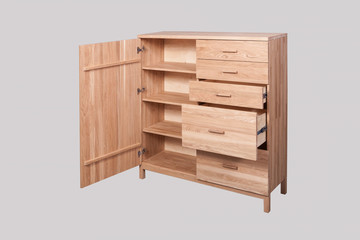 Oak chest of drawers on a light background