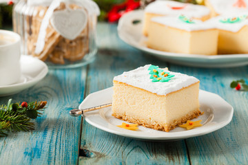 Delicious, traditional cheesecake. Christmas decoration.