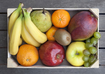 Wooden box of fresh assorted fruit