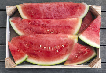 Wooden box of fresh watermelon