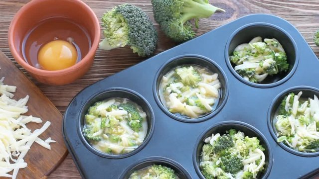 Delicious egg muffins broccoli and cheese. Concept of cooking.