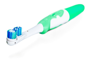 Electric toothbrush isolated on a white background