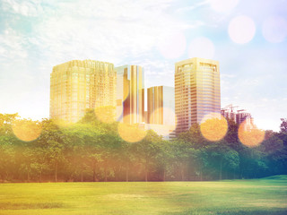 public park in the city and high building, vintage filter effect