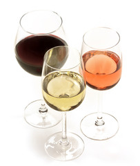 Three glasses of wine: white, rose, and red