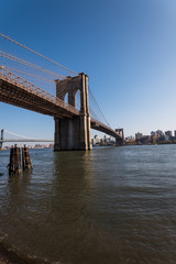 Fototapeta na wymiar Brooklyn bridge with blue sky
