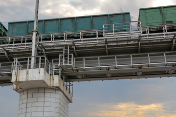 Freight train on the railway bridge.