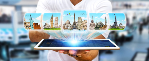 Businessman choosing his holidays between different places of th