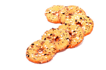 Biscuits with different kind of seeds isolated on white