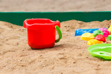 Fototapeta na wymiar bucket and molds in the sandbox