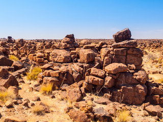 Giant's Playground rock formations on sunny day with clear blue sky near Keetmanshoop, Namibia,...