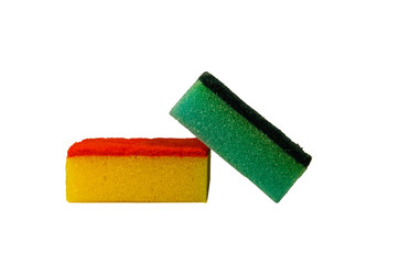 Multicolored kitchen sponges on a white background