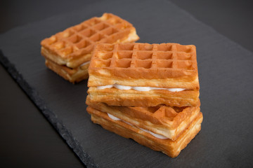 Sweet viennese waffles on dark background