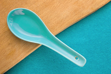 Top view of wooden Board and blue background. For kitchen and menu 