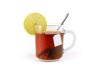 hot drink with a lemon, isolated on white background
