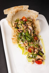 mushroom salad with tomatoes and Arugula