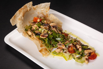 mushroom salad with tomatoes and Arugula