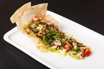 mushroom salad with tomatoes and Arugula