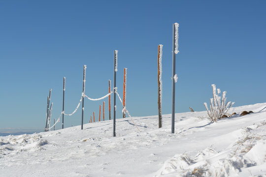 Frozen pilars with rope