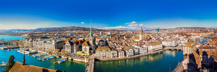 Historic Zürich city center with famous Grossmünster Church, Limmat river and Zürich lake....