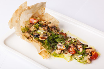 mushroom salad with tomatoes and Arugula
