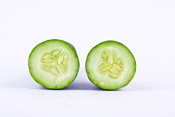 slice of cucumber on white background healthy vegetable food isolated
