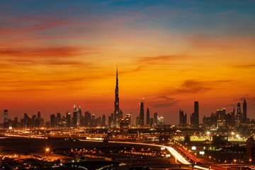 Fototapeta na wymiar A beautiful skyline view of Dubai as viewed from Dubai Festival City during a golden set evening