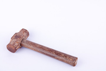  old  used rust Sledge hammer on white background tool isolated
