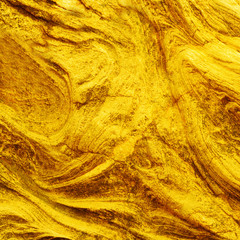 Abstract golden surface closeup background