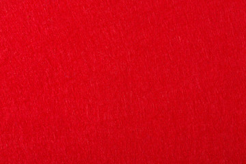 Felt background in red color useful for christmas texture.