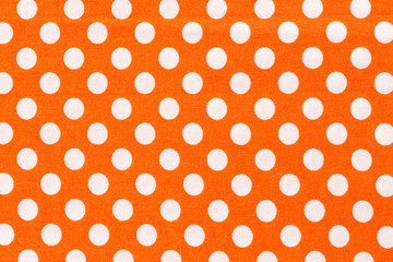 Orange and white distressed polka dots background. - obrazy, fototapety, plakaty