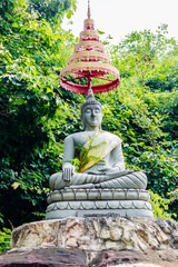 Buddha statue in forest