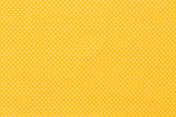 Yellow or gold light smooth and shiny fabric.