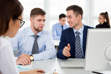 Fototapeta premium Business people having a meeting