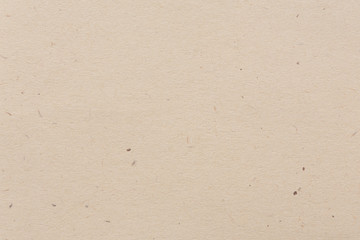 Close up of tan paper background.