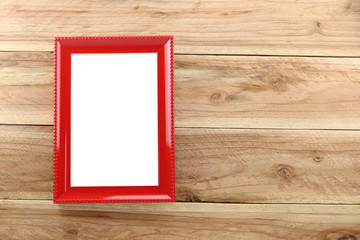  Vintage Red Photo frame on wooden background.