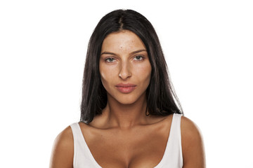 beautiful young woman without make-up, with long hair and blue eyes