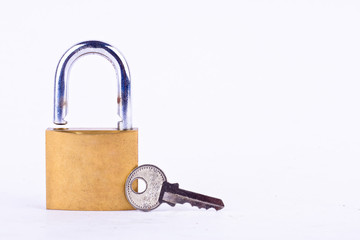  old padlock and key on white background tool isolated
