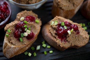 Close-up of sandwiches with liver pate and cranberry sauce