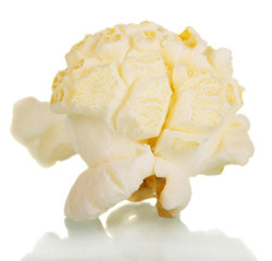 Tasty popcorn close-up isolated on white