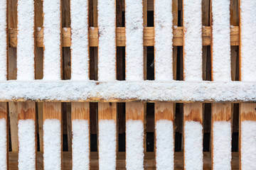 wooden fence with snow in out door