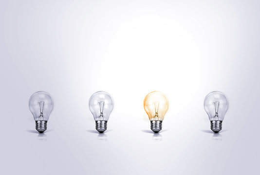 Outstanding creative idea background concept . one Light bulb gl