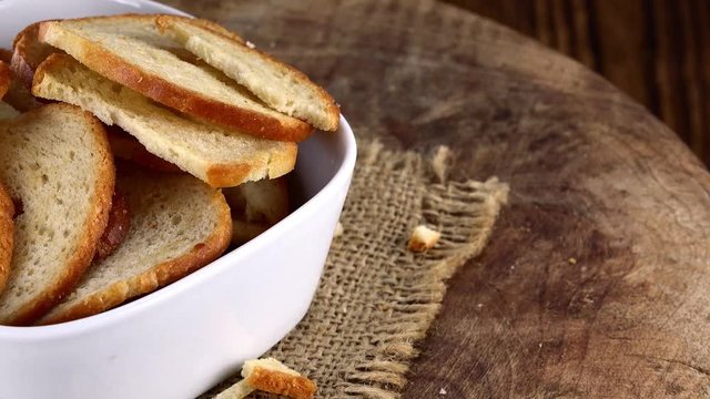 Rotating Bread Chips (seamless loopable; 4K UHD footage)