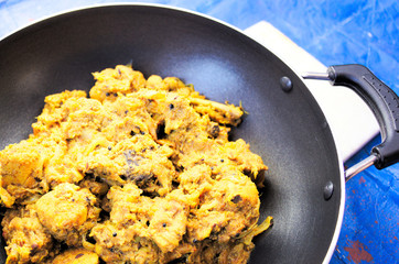 Yummy Dry Chicken Curry is an Indian Cuisine served as a side dish for dinner.