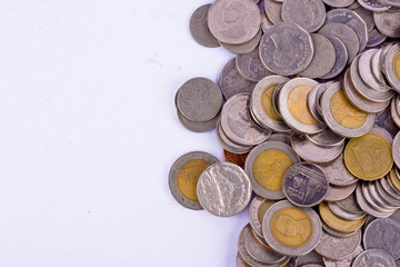 a pile of bath coins on white background finance business isolated

