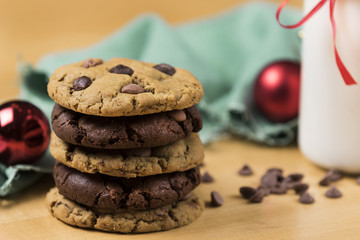 Cookies and Milk for Santa / Cookies and milk with Christmas decoration on a wooden background