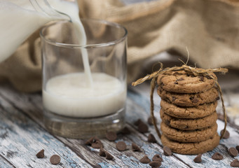 Cookies and Milk  / Cookies and milk on a wooden background