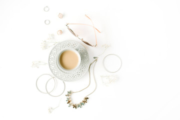 morning breakfast with cup of coffee with milk and trendy fashion accessories arrangement on white, flat lay, top view