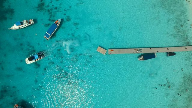 speed boat departure from racha island pier  phuket thailand