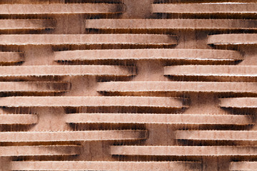 Cardboard strips texture pattern close up as a background